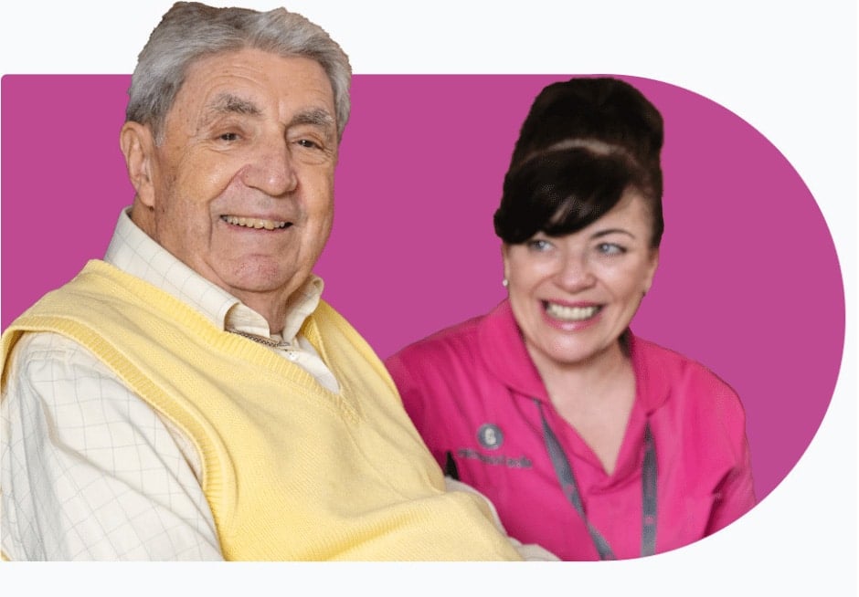 Female Carer with male client who receives Respite Care smiling