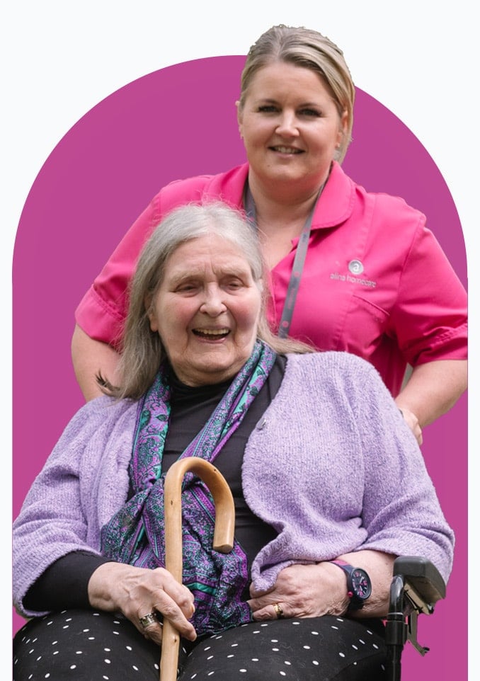 24 Hour Home Care client in wheelchair with Carer