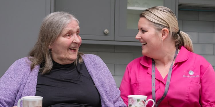 client with carer receiving personal care