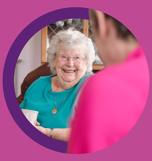 Female client smiling talking to Home Carer